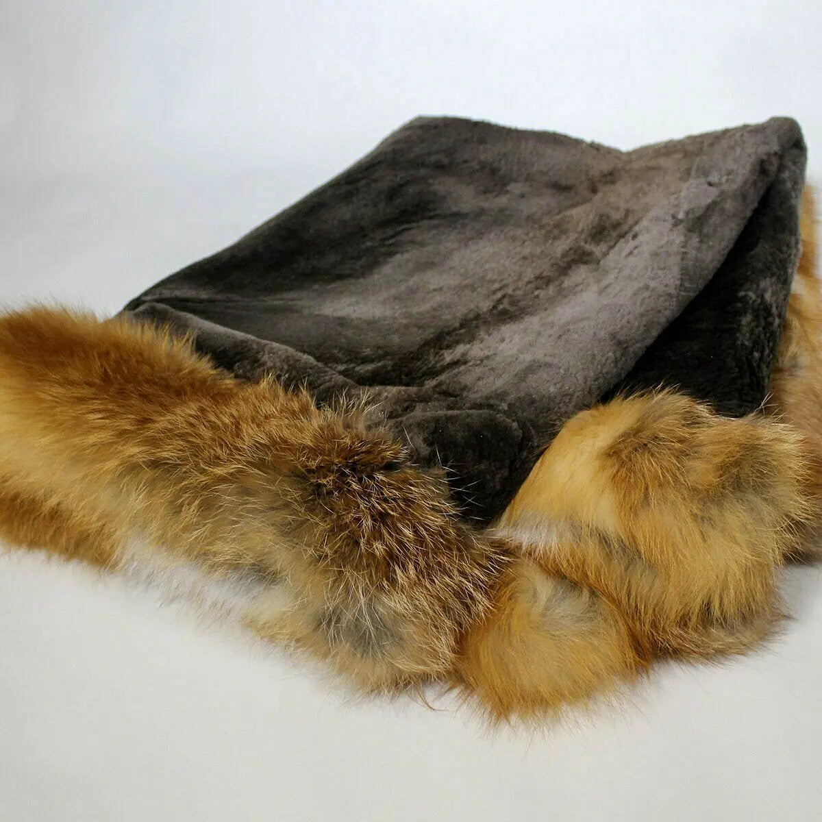 Beaver fur blanket with fox fur trim